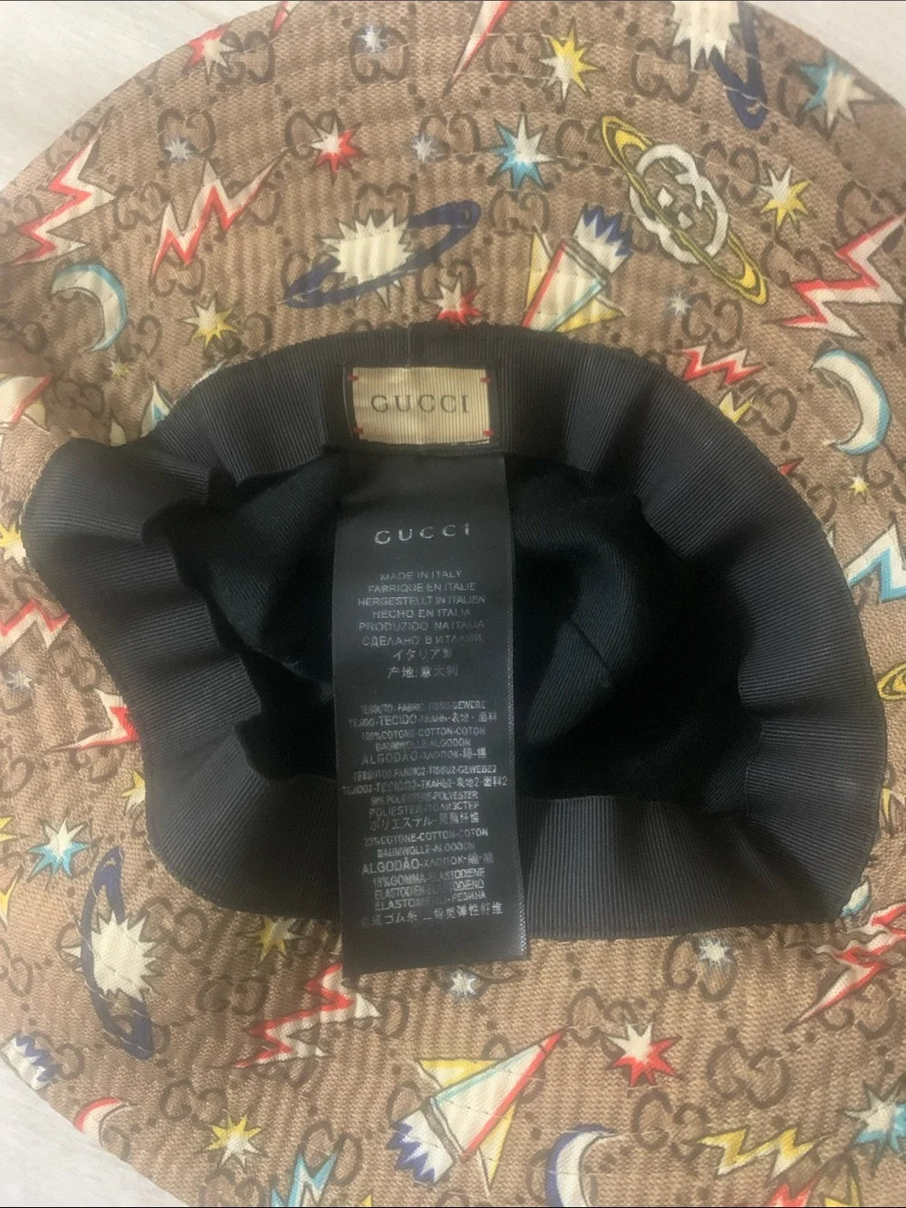 Gucci Brown Monogram Bucket Hat with Multicolor Space Motifs